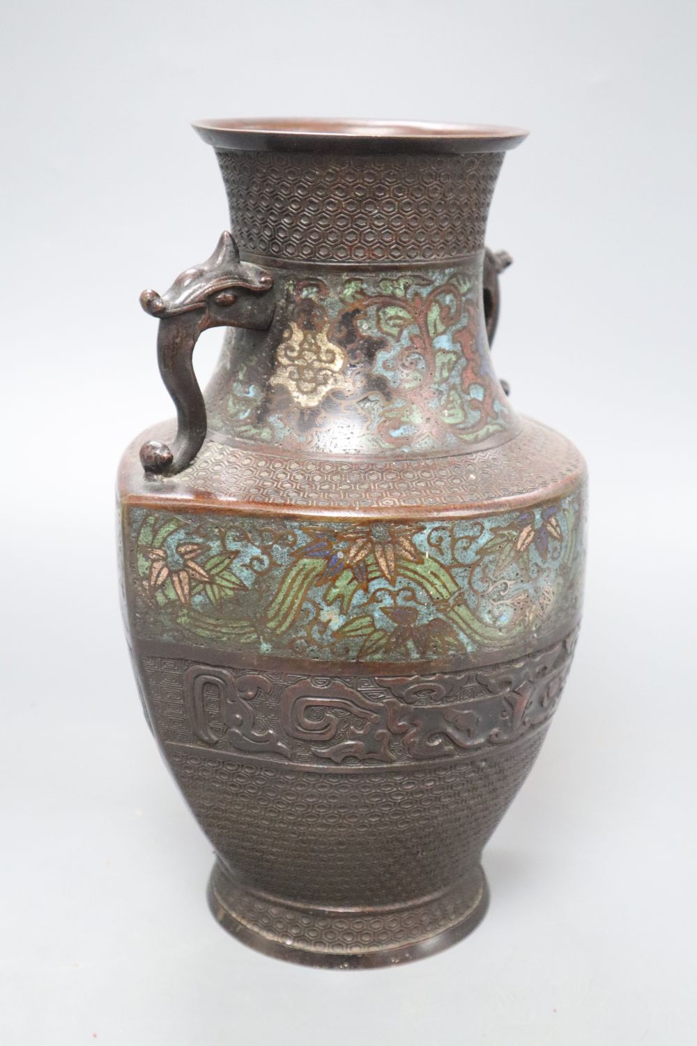 An Oriental bronze and champleve two handled vase, height 28cm